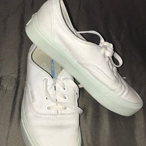 Brand new white on teal trim vans.